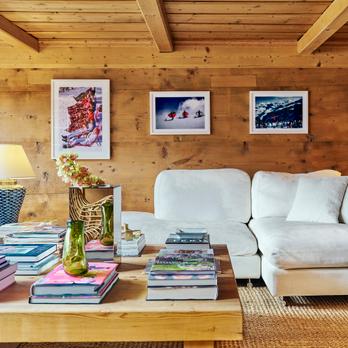 84-club-chalet-lobby-area-relaxing-white-sofa-wall hanging-vintage-posters-books