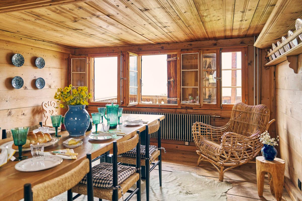 84-club-chalet-dining-area-served-table-wooden-armchair-and-two-open-windows