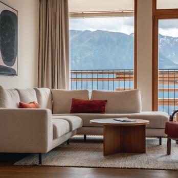 hotel-nidum-bedroom-sofa-mountain-view