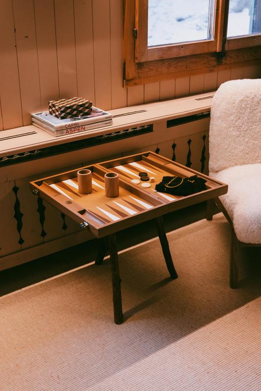 Nils Grubba Le Chalet Saanen bedroom with game and window