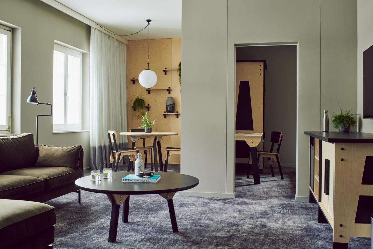 The Cambrian room with desk, coffee table and sofa