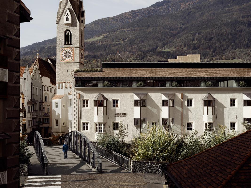 Adler Brixen. Exteriors with bridge. March 2025