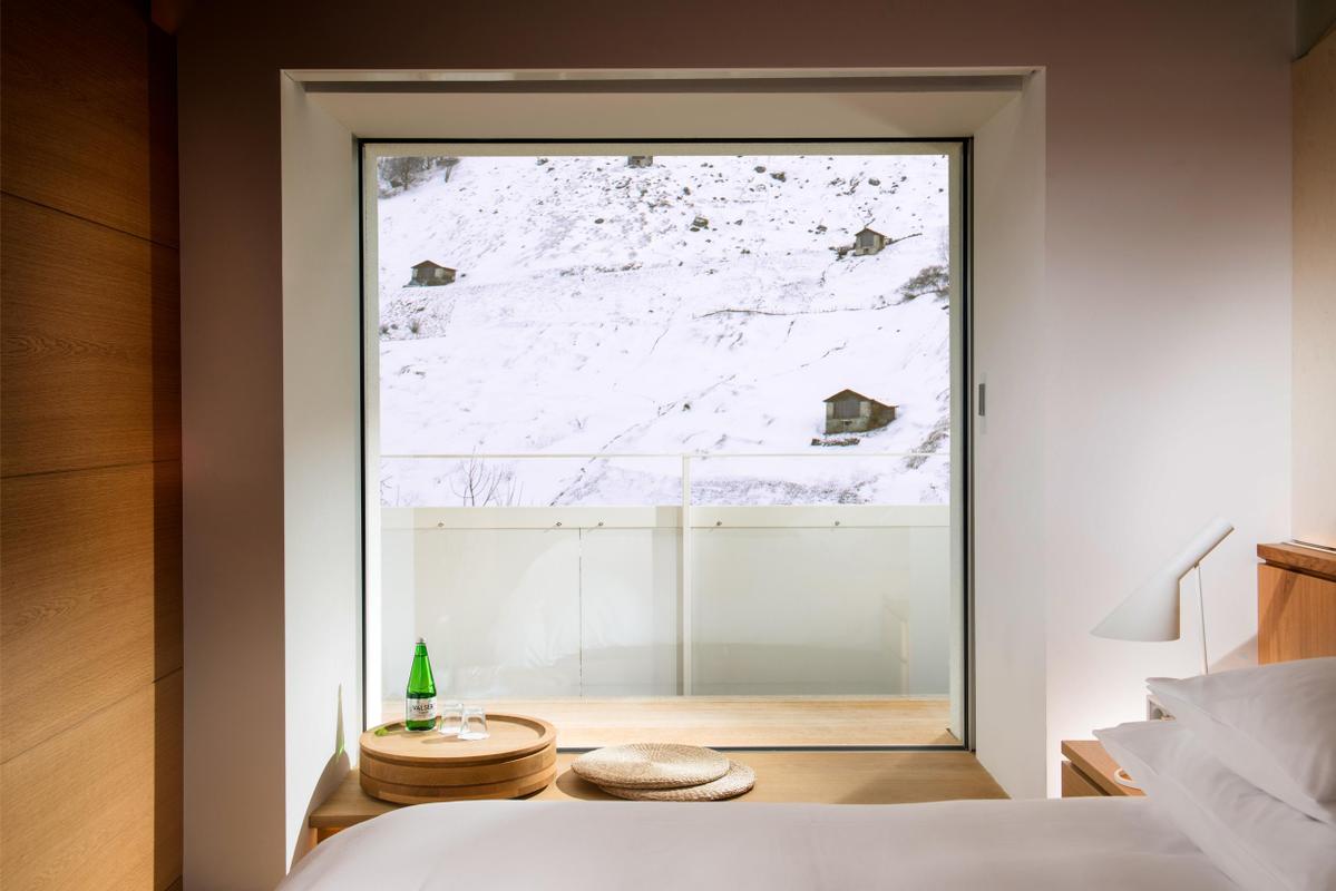 7132 Hotel bedroom suite with winter views