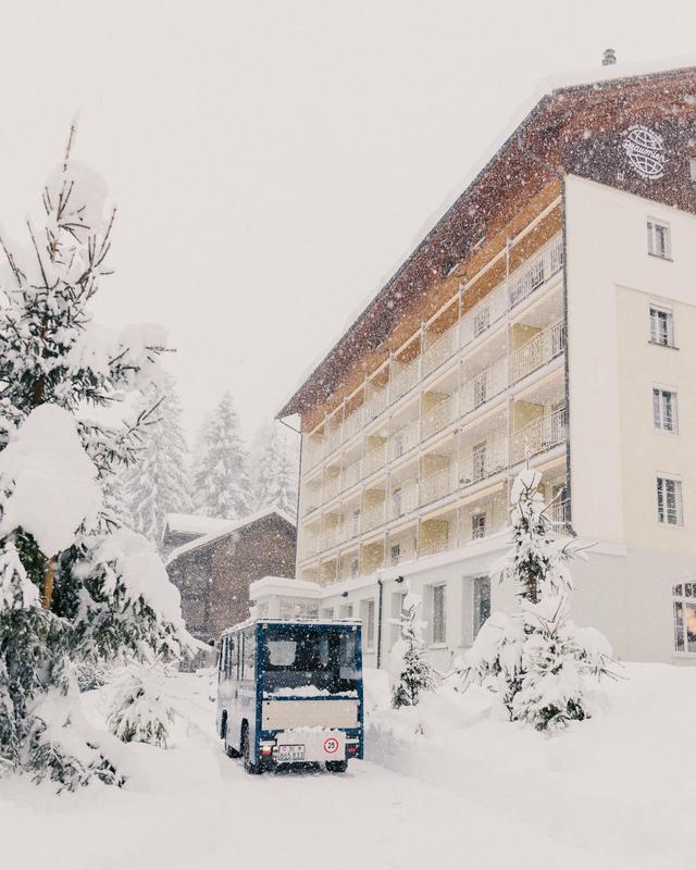 Grand Hotel Belvedere car in snow in front of hotel