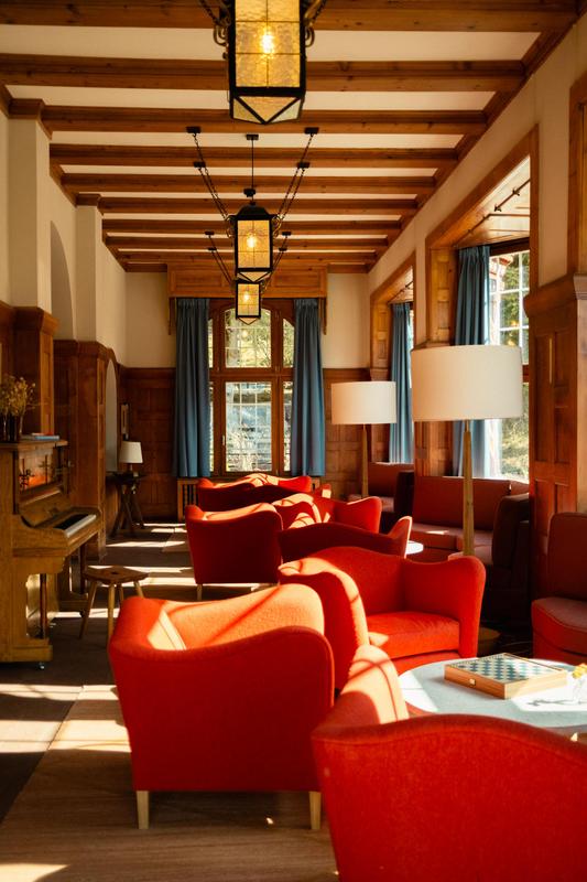 Grand Hotel Belvedere lobby with blue lounge chairs