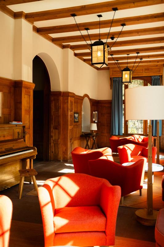 Grand Hotel Belvedere lobby with red lounge chairs different angle