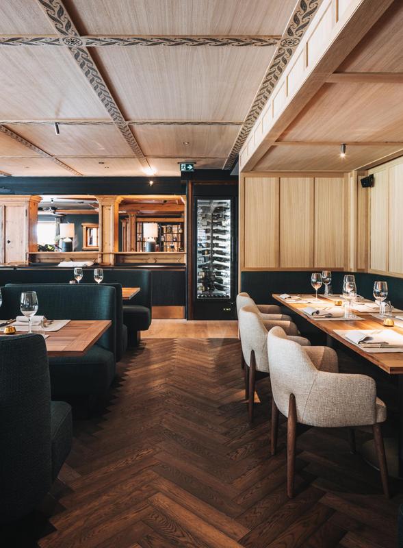 Der Berghof_restaurant with hall with tables February 2025