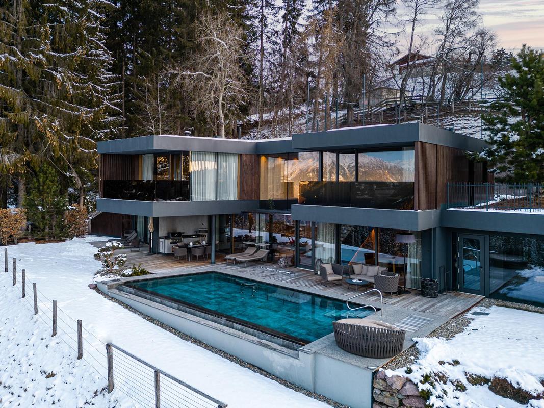 Chalet Mirabell_exterior. Modern view during winter