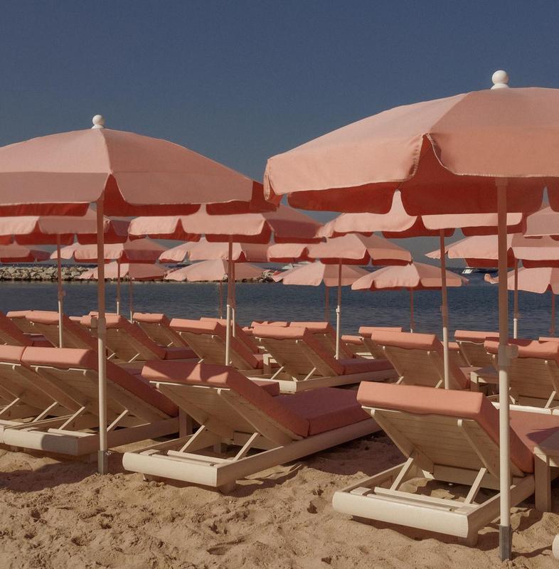 Cap d'Antibes Beach Hotel Beach with sunbeds with umbrellas at beach