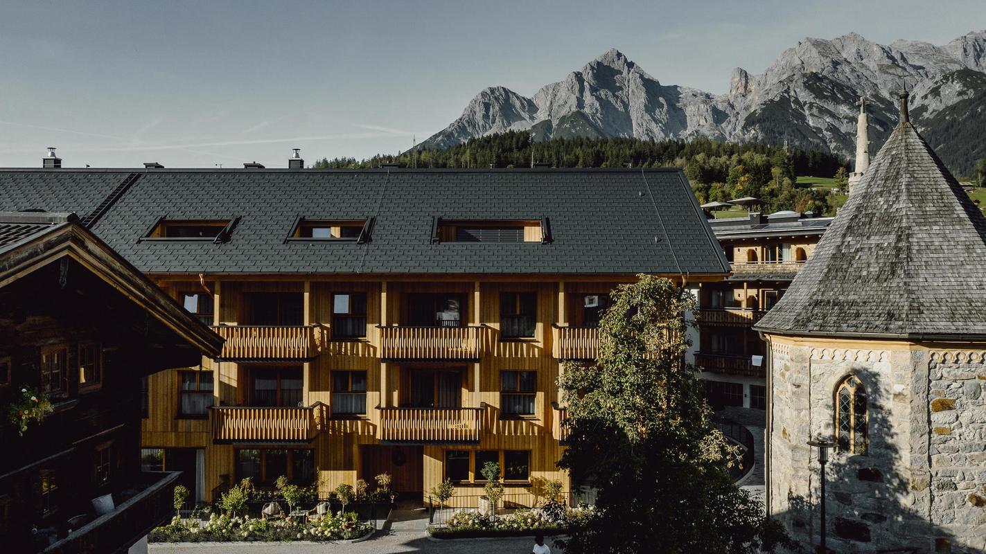 Post Maria Alm_facade from other side in summer with moutains in backdrop