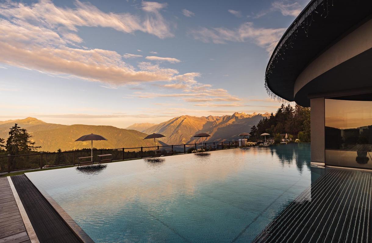 Chalet Mirabell_summer. Pool during afternoon
