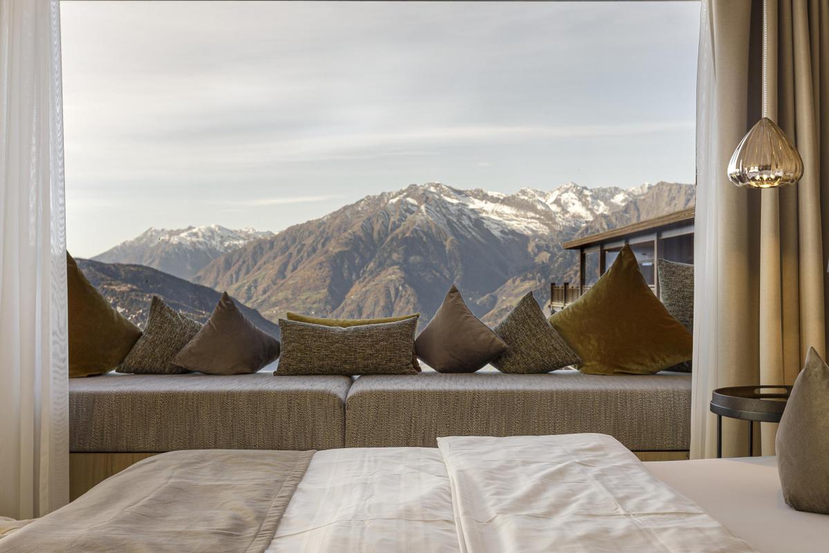 Chalet Mirabell_suite with pillows and views